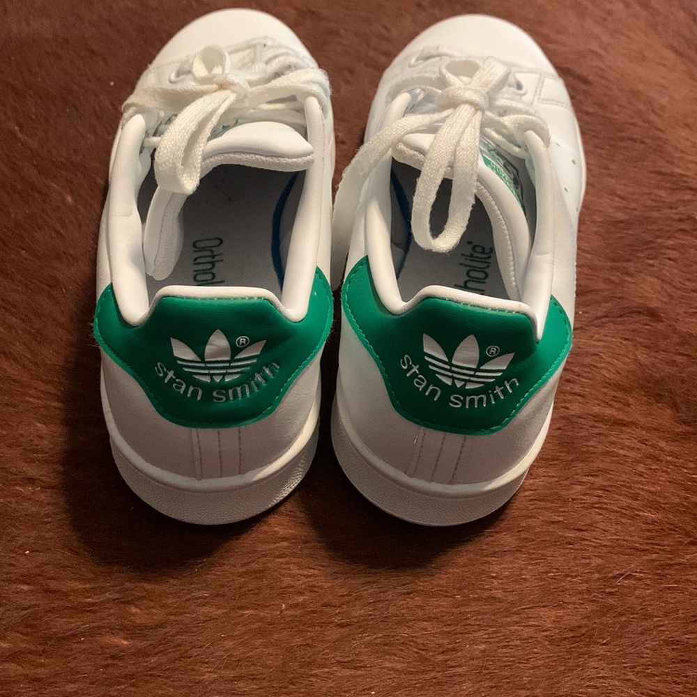 Adidas Stan Smiths. White and green. Men’s size 5. Women’s size 7.